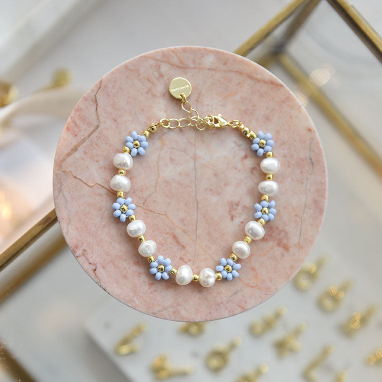 Linn  blomsterarmbånd lyseblå