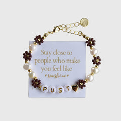 Pust blomsterarmbånd brun